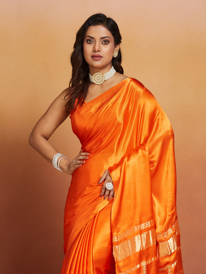 Sunset Flame Pure Silk Saree with Golden Zari Border