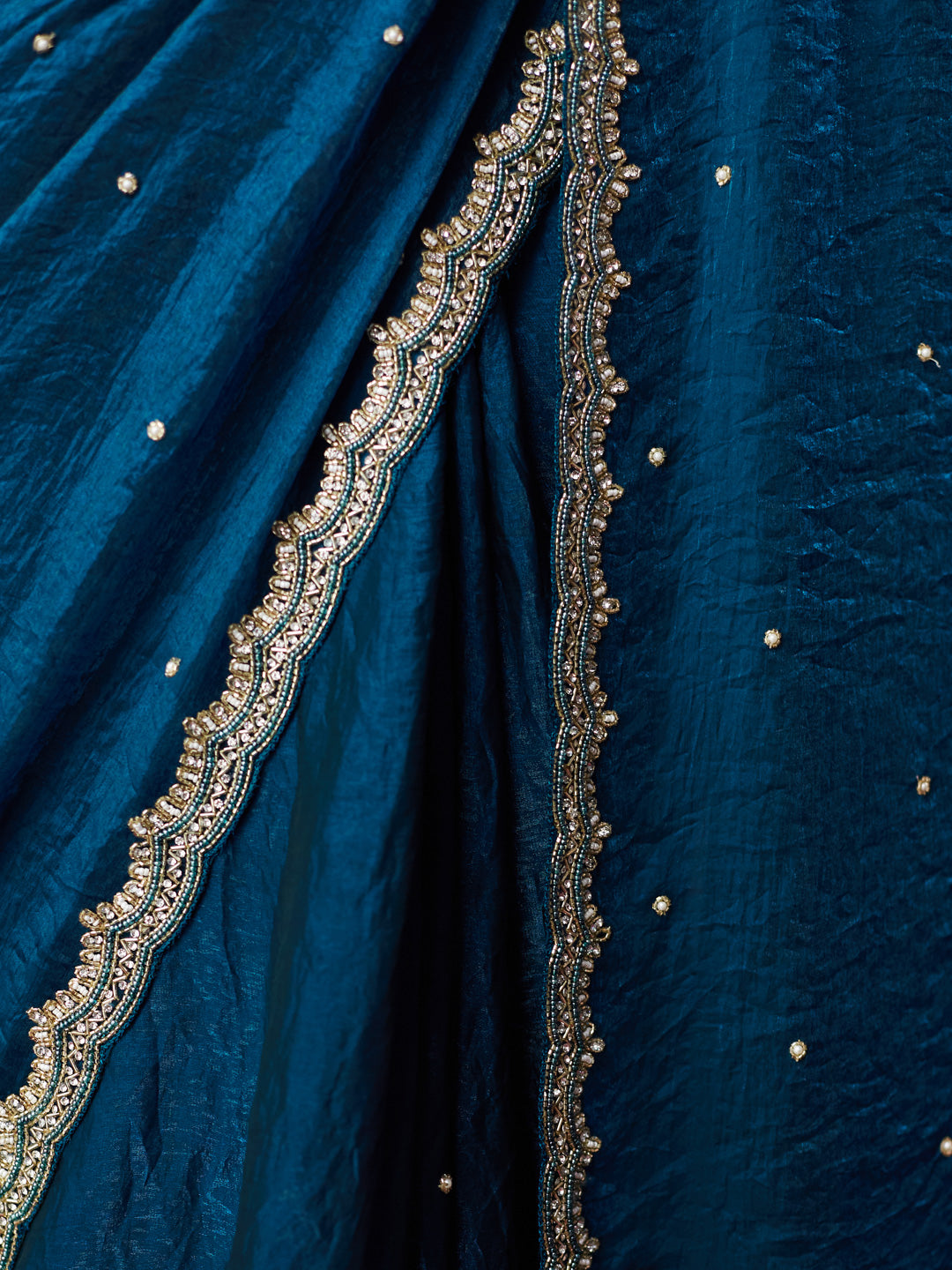 Teal Elegance Embellished Saree
