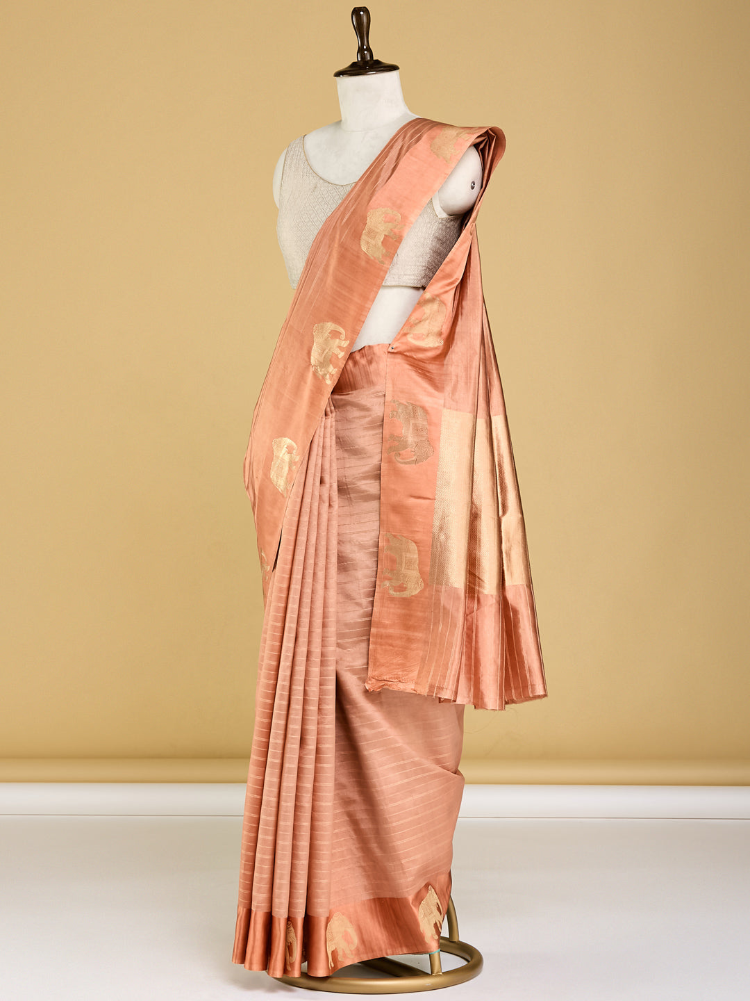 Elegant Peach Banarasi Saree with Golden Elephant Motifs