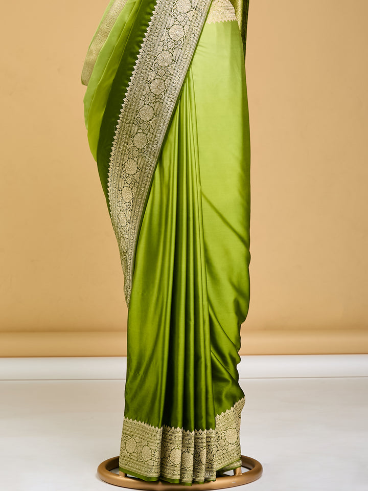 Luxurious Green Banarasi Saree with Intricate Golden Border